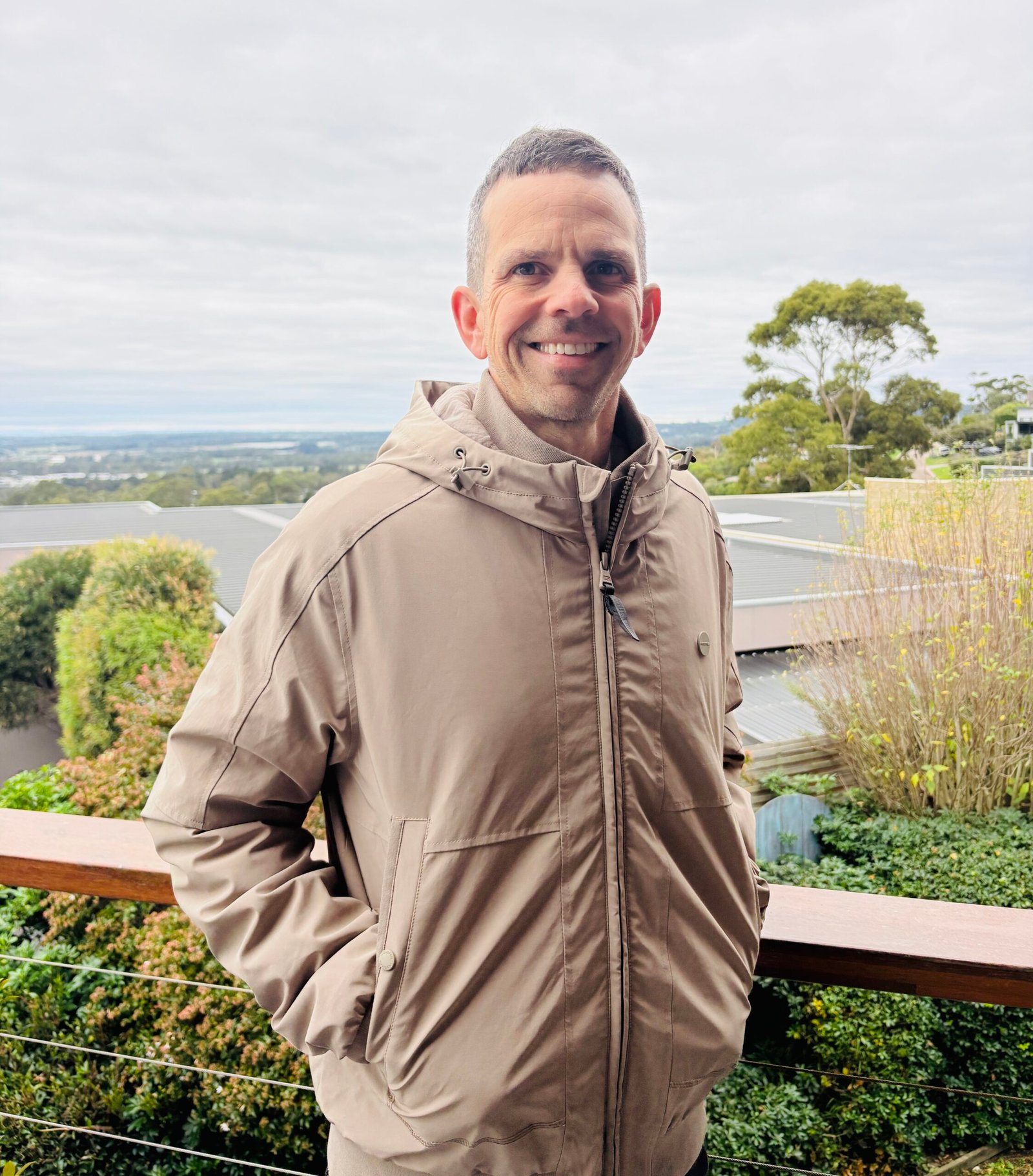 Dan Serratore, creator of Attune, smiling outdoors